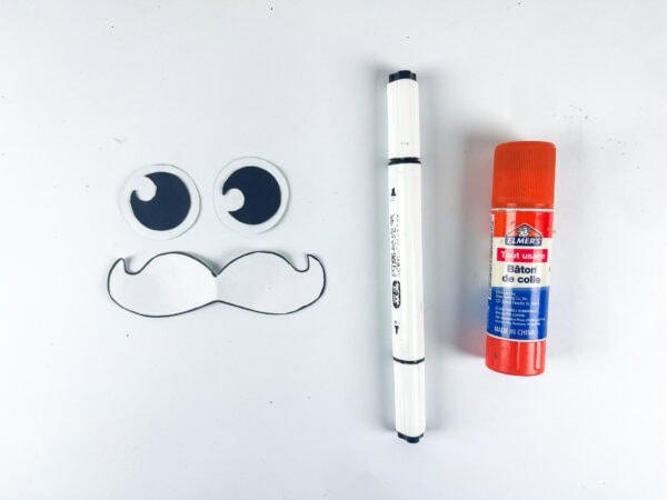 Uncle Sam eyes and mustache with glue stick and marker