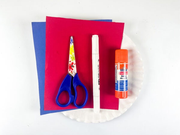 Paper plate craft supplies with scissors and glue