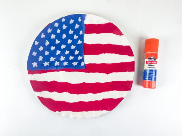 Finished American flag paper plate craft with glue