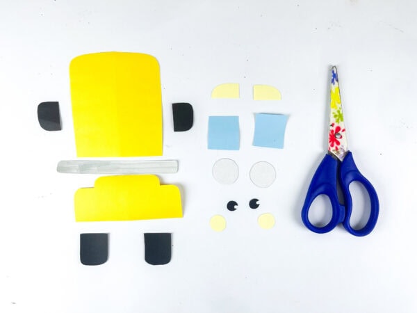 Cut paper pieces for school bus craft