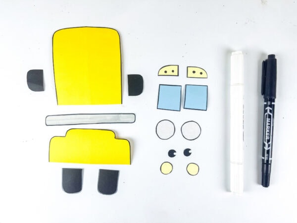 Outlined school bus craft pieces with marker and pen