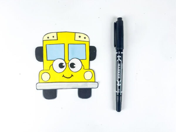 Finished rocking school bus craft with smile