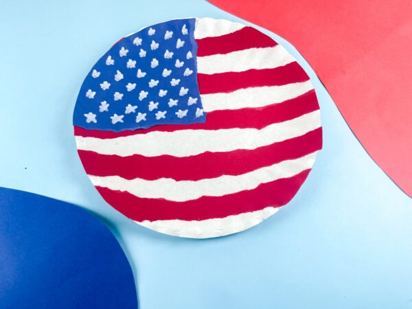 American flag paper plate craft on blue background