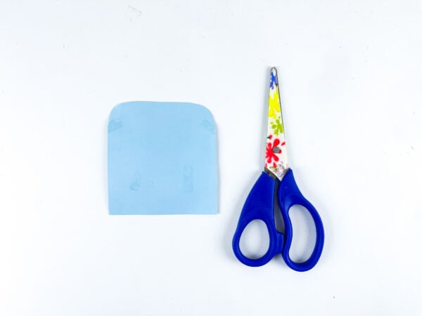 Blue paper car window and scissors