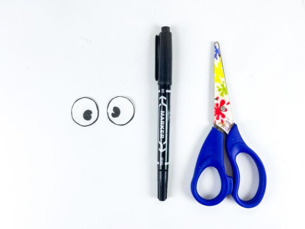 Cut paper eyes for pencil craft