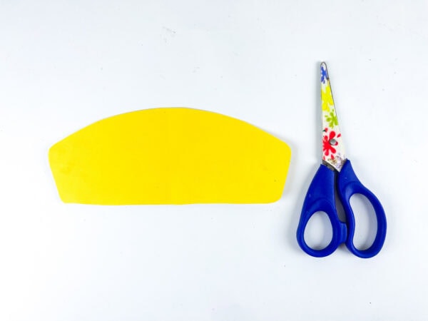Yellow bus top cutout with scissors
