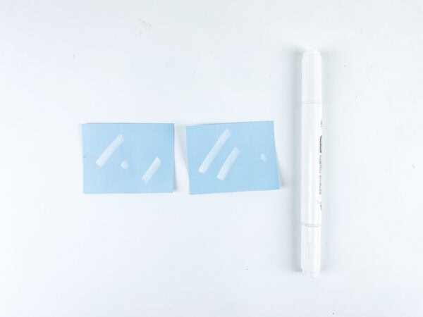 Blue paper bus windows with white marker details