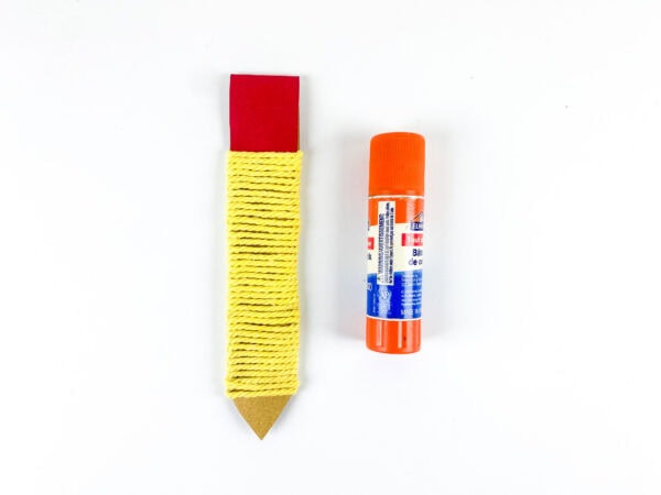 Pencil craft with red top and glue stick