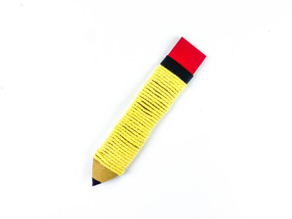 Completed yarn pencil craft on white background