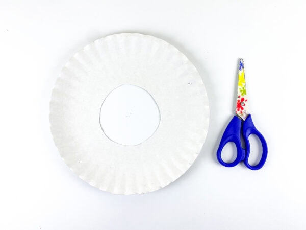 Paper plate wreath cutout with scissors