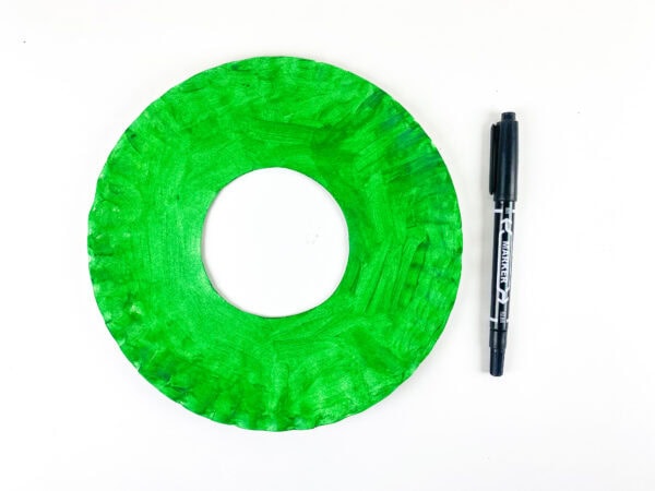 Green painted paper plate wreath