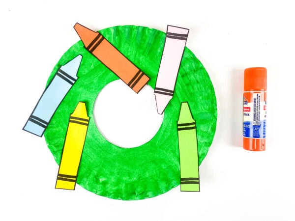 Paper crayons glued onto green wreath