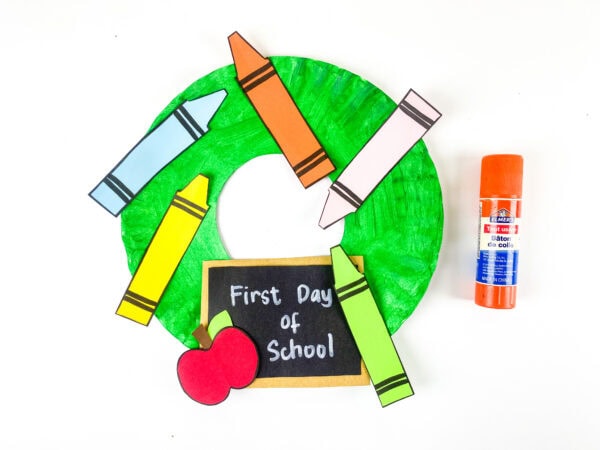 School wreath craft with crayons and glue stick