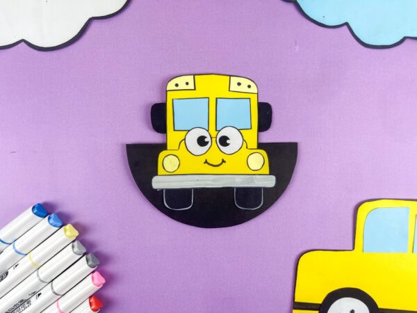 Rocking school bus craft on purple background