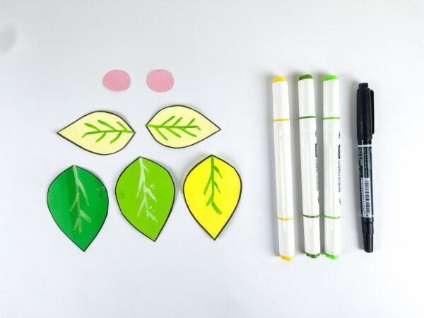 Colored leaf pieces and markers