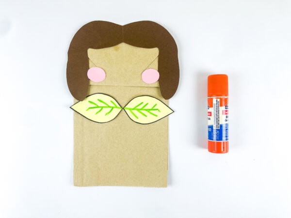Blush and top leaves glued to paper bag