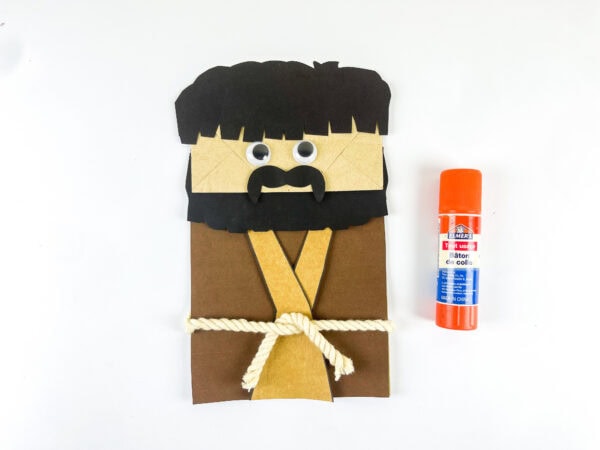 Add googly eyes to Moses craft