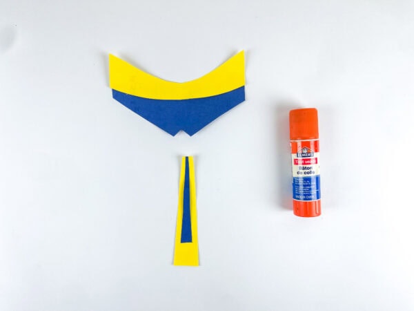Blue and yellow collar pieces with glue stick
