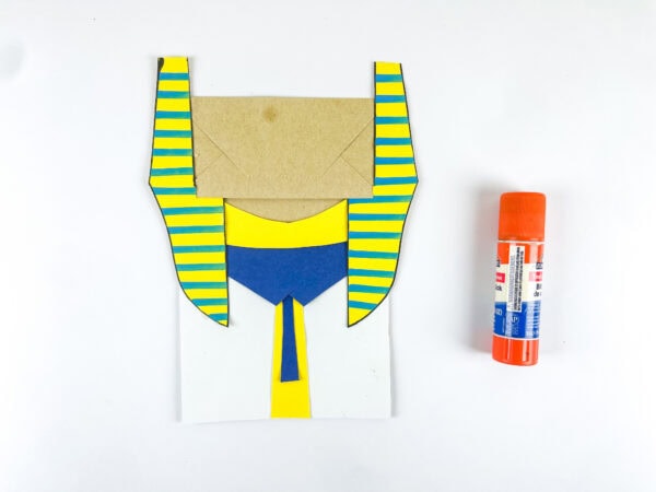 Headdress attached to paper bag