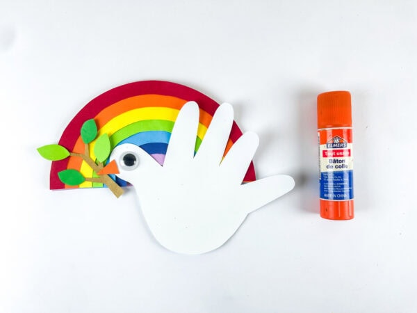 Dove attached to rainbow craft