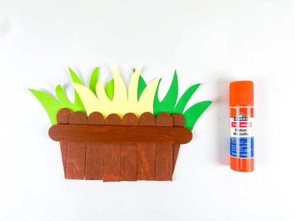 Adding grass to the basket craft