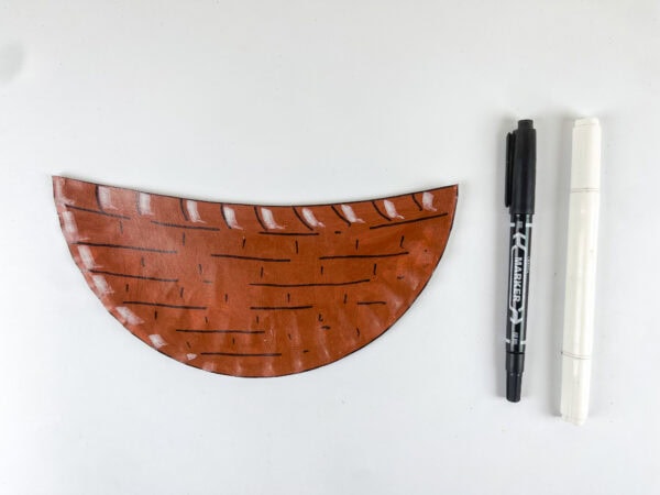 Paper plate basket with drawn details