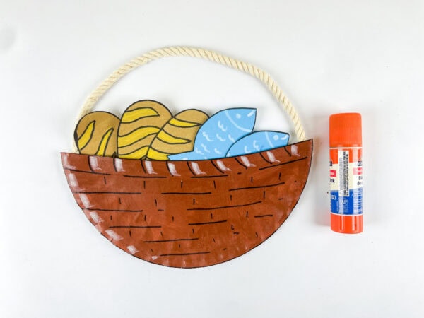 Bread and fish glued into basket