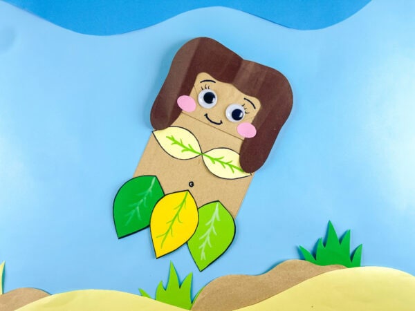 Eve paper bag craft on blue background