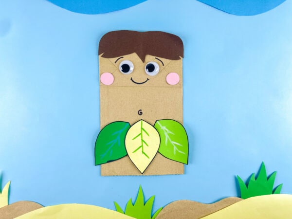 Adam paper bag craft on blue background