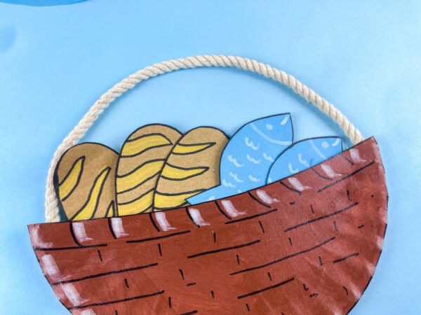 Close-up of Jesus Feeds 5000 basket craft