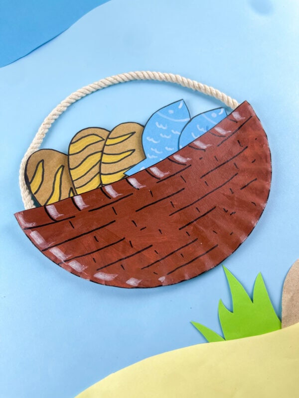 Close-up of basket with loaves and fish