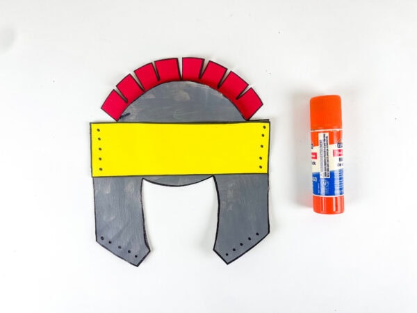Red crest attached to helmet craft