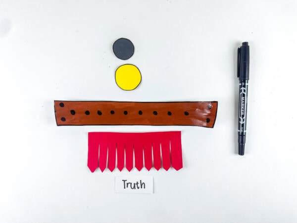 Belt strip with buckle pieces and truth label