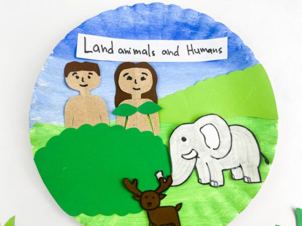 A close-up view of the completed creation craft paper plate centered on a white background.