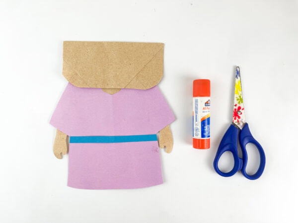 Glue robe onto paper bag