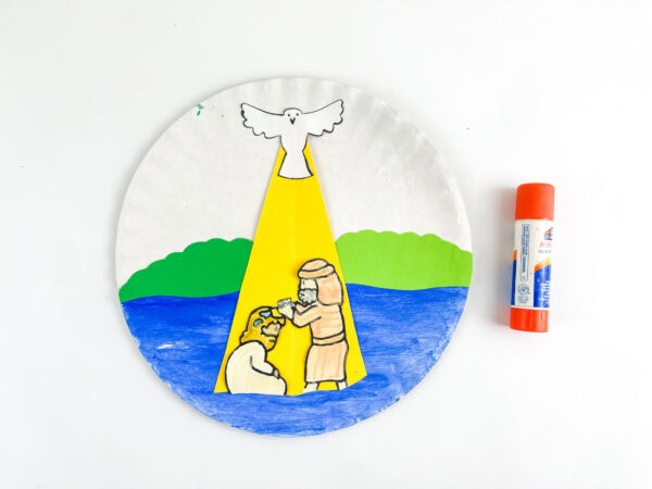 Craft pieces attached to paper plate scene