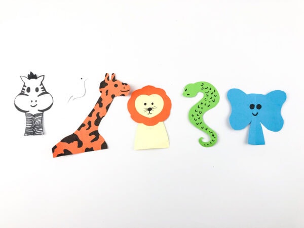 Animal cutouts with drawn details: zebra, dove, giraffe, lion, snake, and elephant.