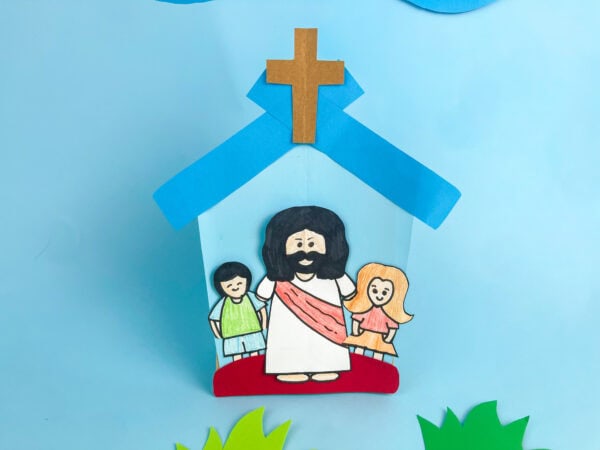 Jesus Loves the Little Children craft on a blue background