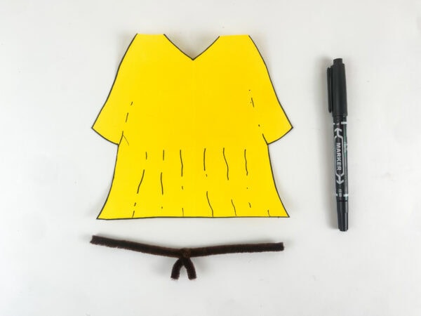 Deborah craft yellow robe with black marker detail lines and fold texture added pipe cleaner belt below