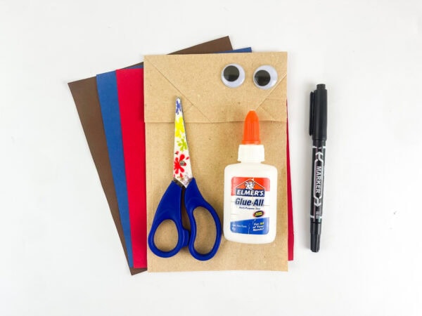 supplies for Ezekiel Bible craft for kids paper bag construction paper brown blue red googly eyes scissors glue marker