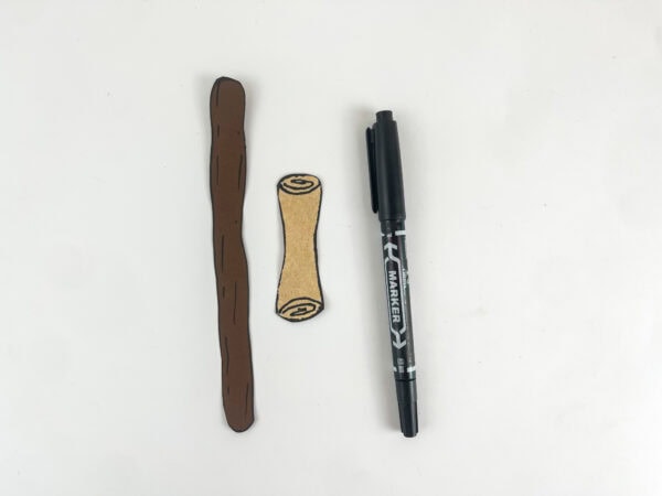 Ezekiel craft walking staff with wood grain marker lines and scroll with spiral ends completed props