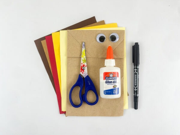 supplies for Gideon Bible craft for kids paper bag construction paper googly eyes scissors glue marker

