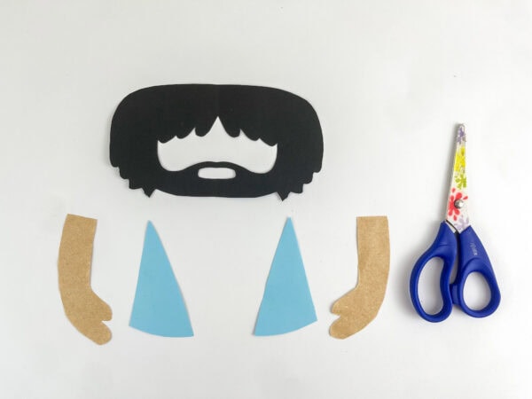 Cut-out craft pieces with scissors.