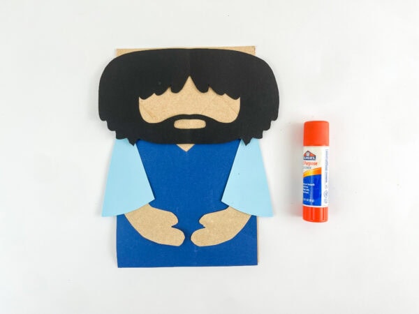 Cain craft assembled on a paper bag.