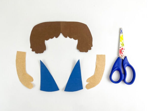 Cut-out craft pieces with scissors.