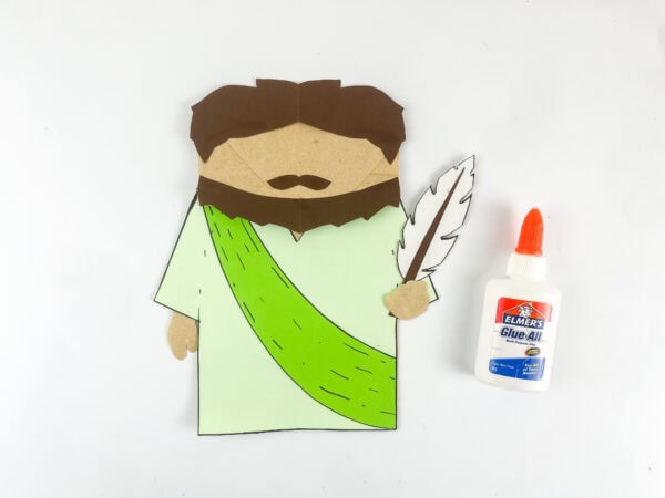 Adding a quill to the prophet Isaiah puppet
