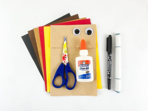 Supplies for making a Joshua paper bag puppet
