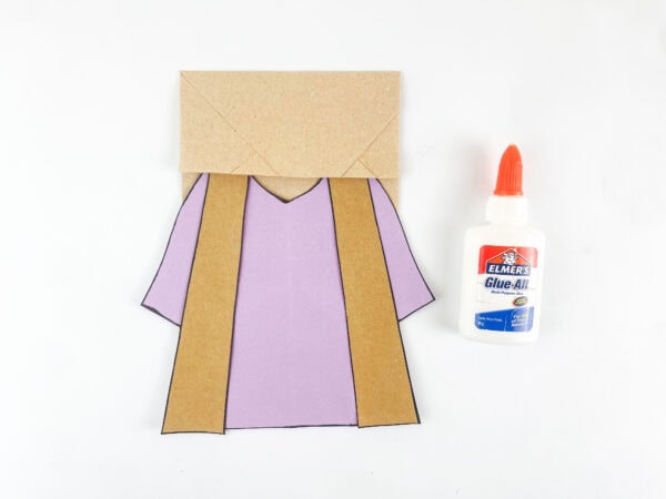 Dress attached to the paper bag
