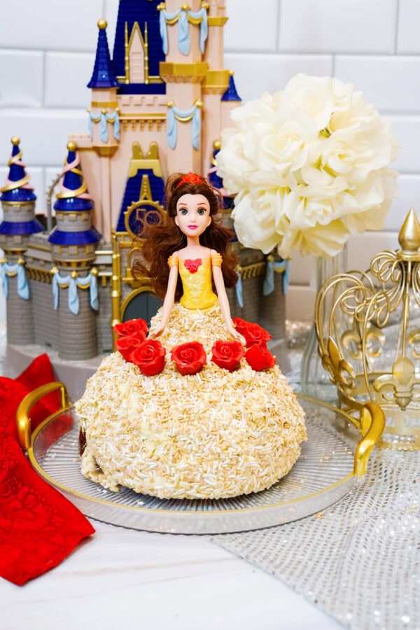 Easy Princess Belle cake with yellow frosting and red roses