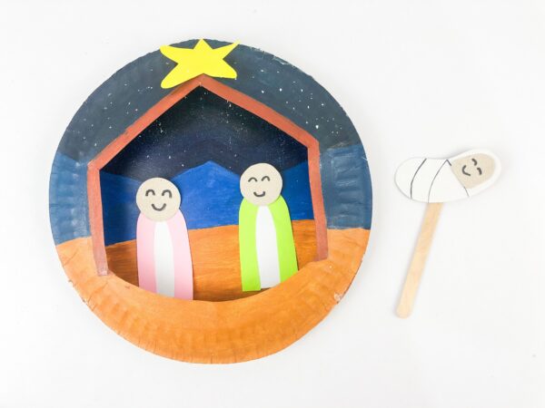Nativity scene with Mary and Joseph inside, Baby Jesus on a stick below